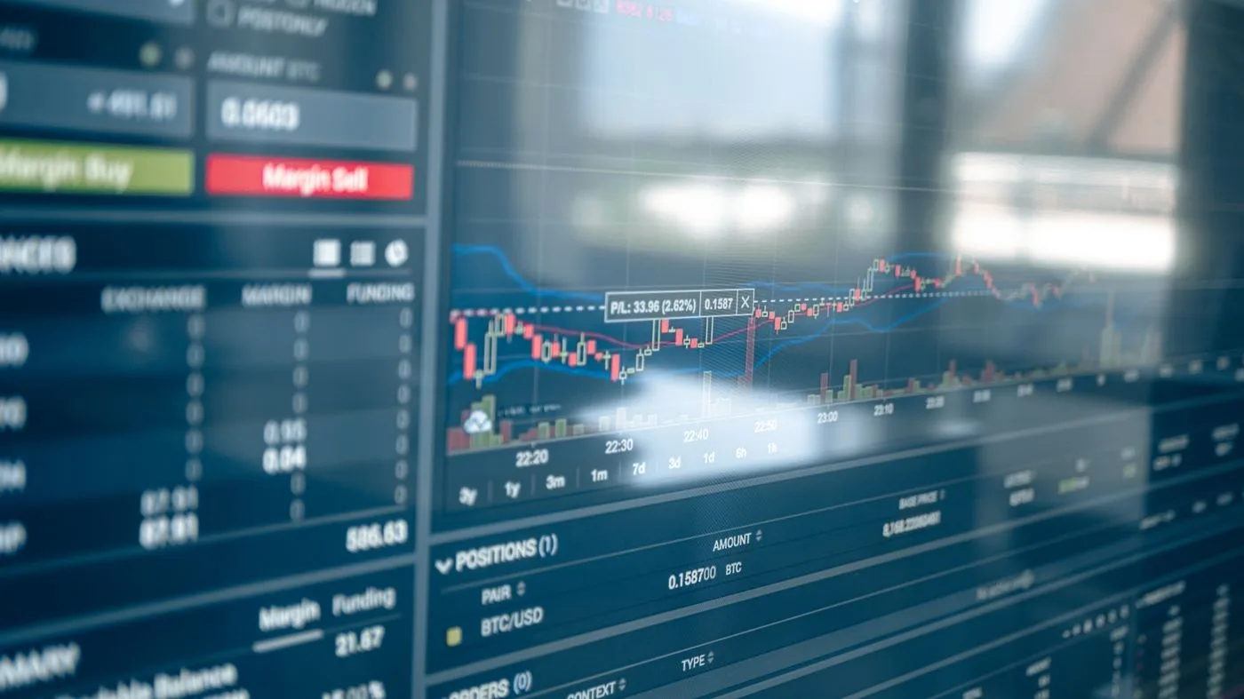 Cryptocurrency trading screen with market charts and price data — Tether USDT desk operations 2026